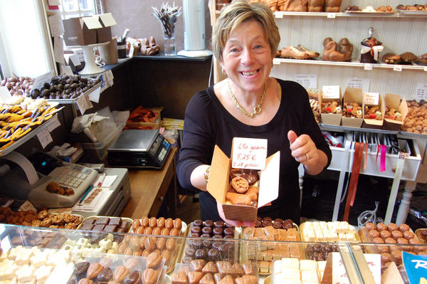 Mme Dumon in her chocolate shop, Bruges, Belgium