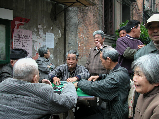 Elderly locals playing mahjong, Shanghai, China