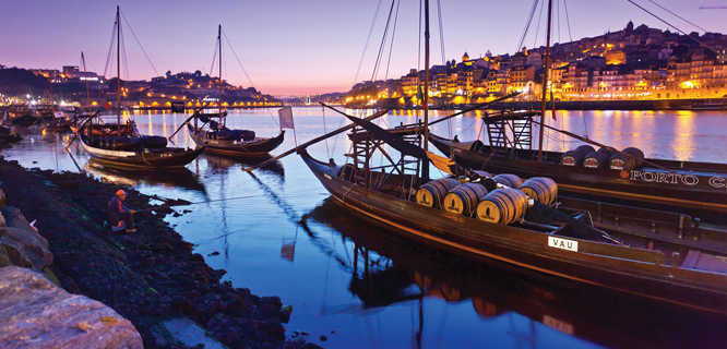 Port wine boats along Cais da Ribeira, Porto, Portugal