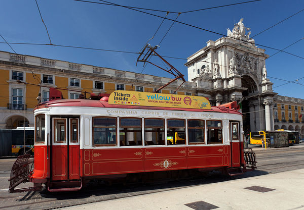 Tourist trolley on Praça do Comércio, Lisbon, Portugal