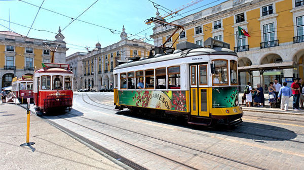 Trolleys on Praça do Comercio, Lisbon, Portugal
