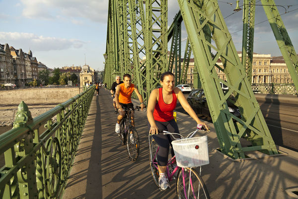 Biking over Liberty Bridge, Budapest, Hungary