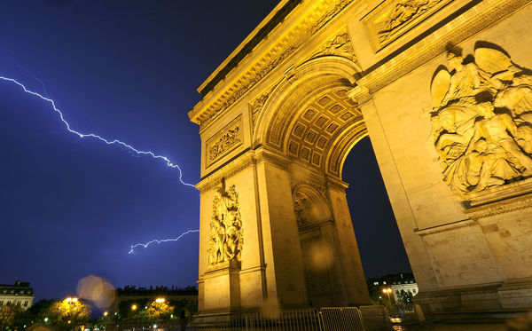 Arc de Triomphe in thunderstorm, Paris, France