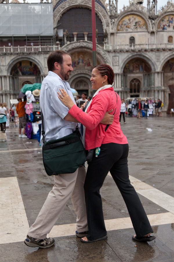 Dancing couple on St. Mark's Square, Venice, Italy