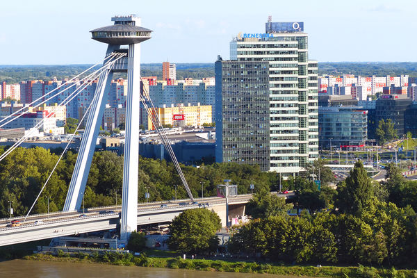 SNP Bridge and its "UFO" observation deck (with Petržalka suburb in background), Bratislava