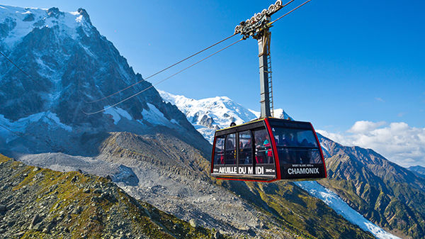 Cable car stretching between Mont Blanc's Aiguille du Midi viewpoint and Chamonix, France