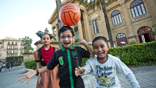 Kids playing soccer in Palermo, Sicily, Italy