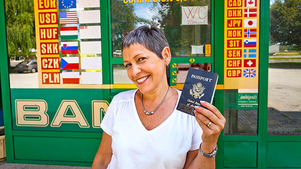 lady-holding-passport