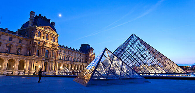 Paris Louvre pyramid at night 