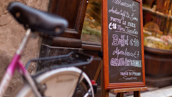 Café sign in Lucca, Italy