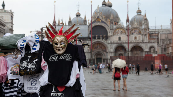 T-shirt stand on St. Mark's Square, with St. Mark's Basilica, Venice