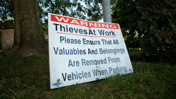 Sign warning of theft in the area