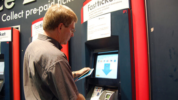 Rick Steves buying a train ticket