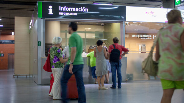 Information booth at train station, Madrid, Spain