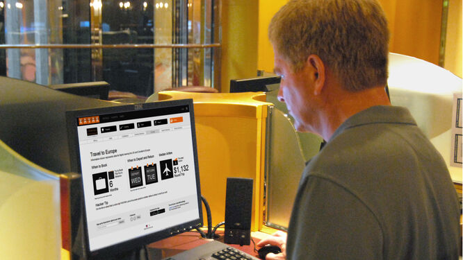 Rick Steves booking a flight on computer