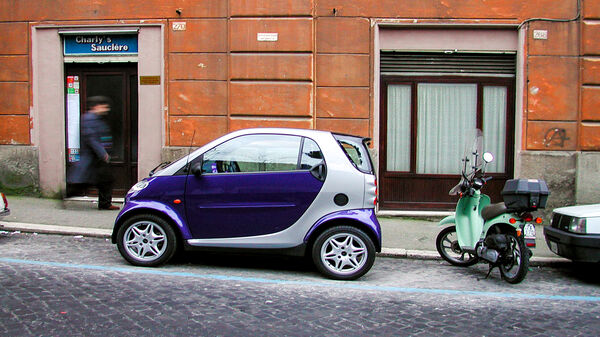 Smart car and moped, Paris, France