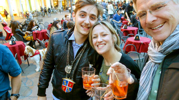 Rick Steves enjoying aperitivo time on Piazza Erbe, Padua