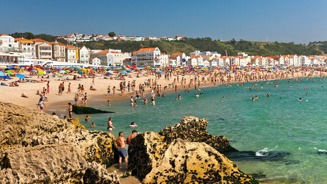 Crowded beach in Nazaré, Portugal