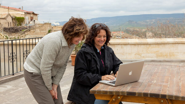 Women using laptop computer, Cappadocia, Turkey