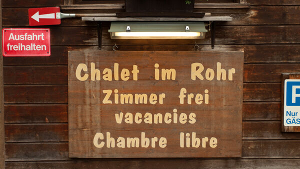 Hotel sign in multiple languages, Switzerland