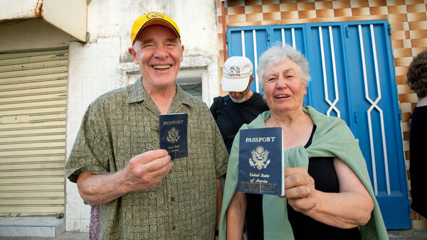 Couple holding United States passports