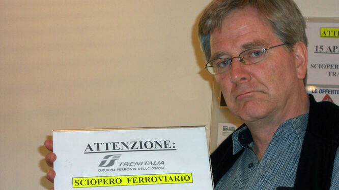 Rick Steves holding Trenitalia rail strike notice