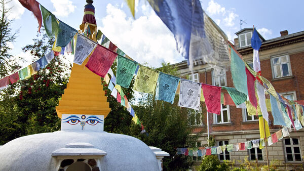 Tibetan stupa and prayer flags in the middle of Copenhagen's Christiania enclave