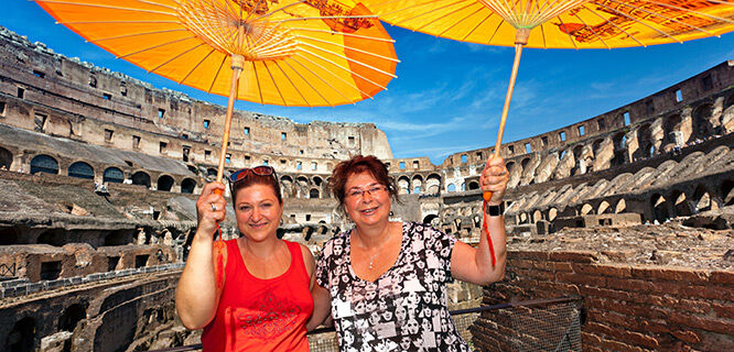 italy-rome-colosseum-gals-with-orange-umbrellas