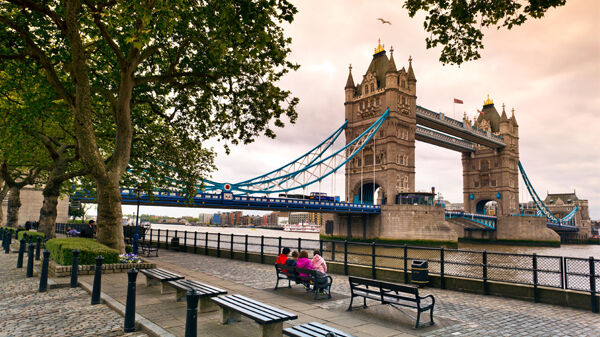 Tower Bridge in London, as seen from the banks of the River Thames 