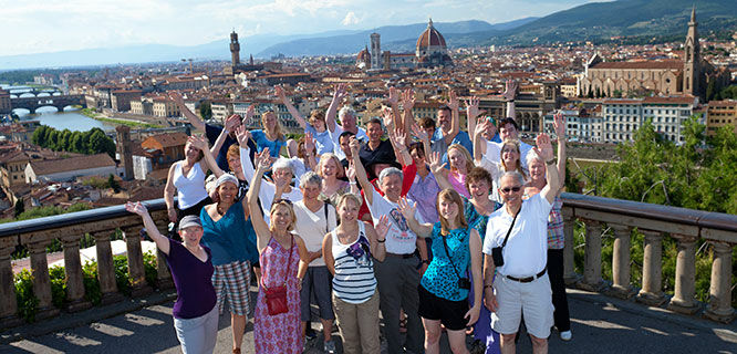 Waving tour group in Florence, Italy
