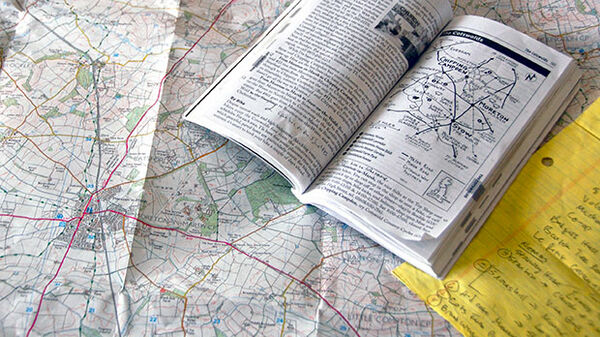 Research with map and guidebook