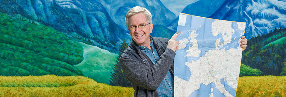Rick Steves holding a map