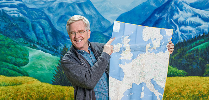 Rick Steves holding a map 
