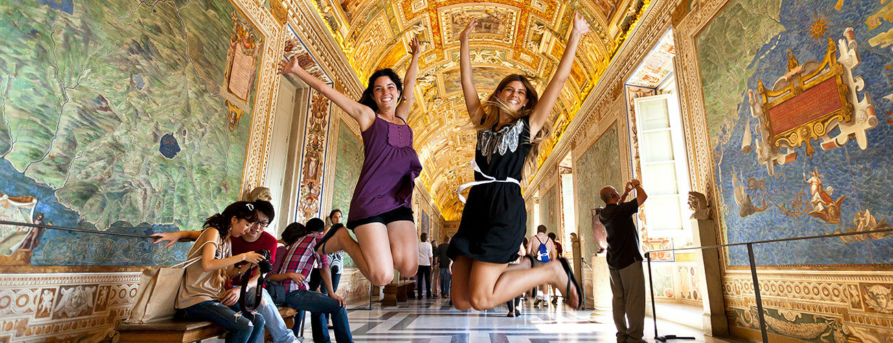 italy-rome-vatican-museums-girls-jumping