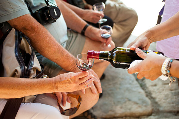 Sampling port wine in the Douro Valley, Portugal