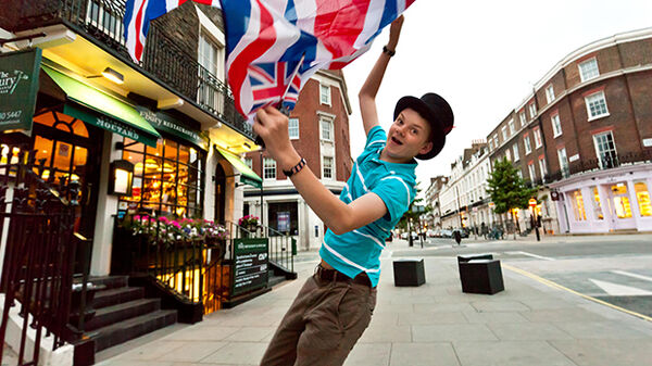 Kid waving the British Flag