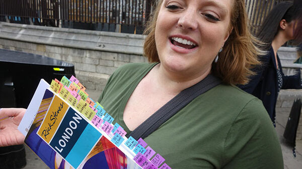 Girl with London Guidebook