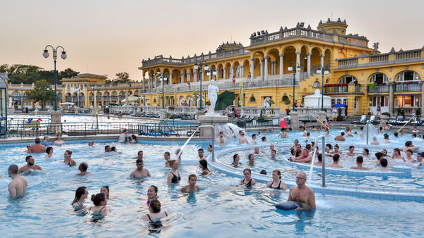 Hungarian bathers enjoying the outdoor hot-water pools of the Széchenyi Baths in Budapest