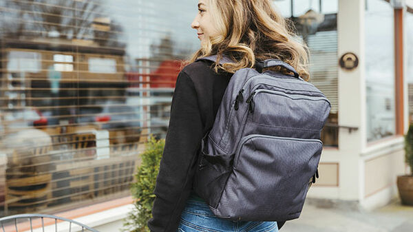 Woman wearing Oslo backpack