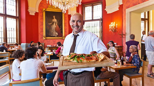 Waiter in fancy cafe, Vienna