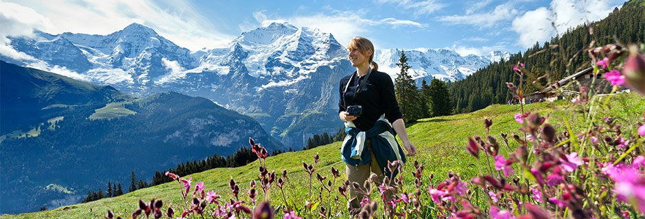 Girl in meadow, Murren, Switzerland