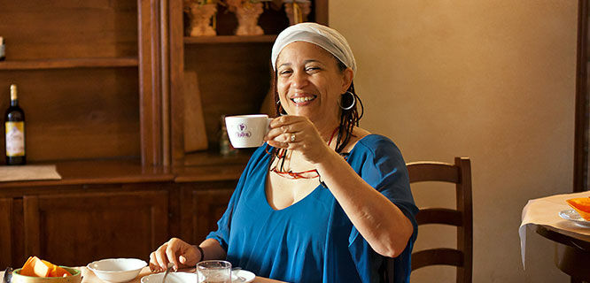 italy-tuscany-lady-with-coffee-cup