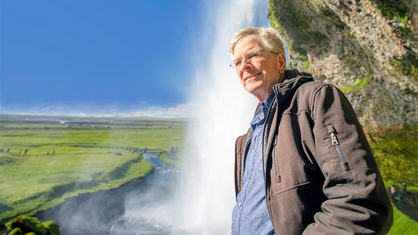 Rick Steves at Seljalandsfoss waterfall in Iceland