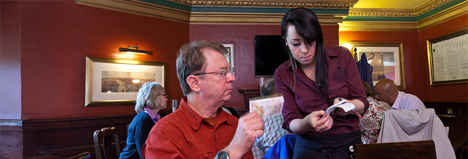 Man tipping at restaurant