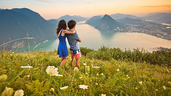 Couple at lake overlook, Lugano, Switzerland