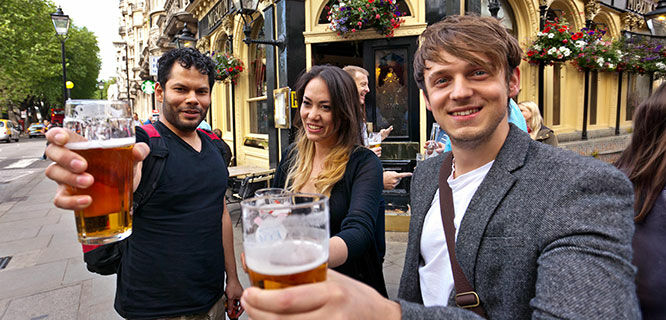 london-three-people-cheers-at-pub