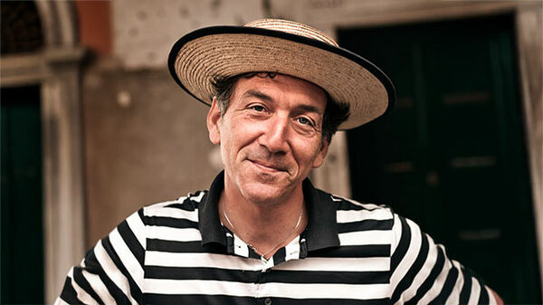 Headshot of gondolier, Venice, Italy