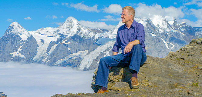 Rick sitting on perch at the Schilthorn, Switzerland