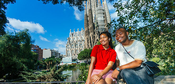 couple in front of sagrada familia in barcelona