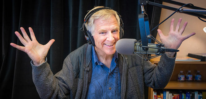 Rick waving his hands in radio studio